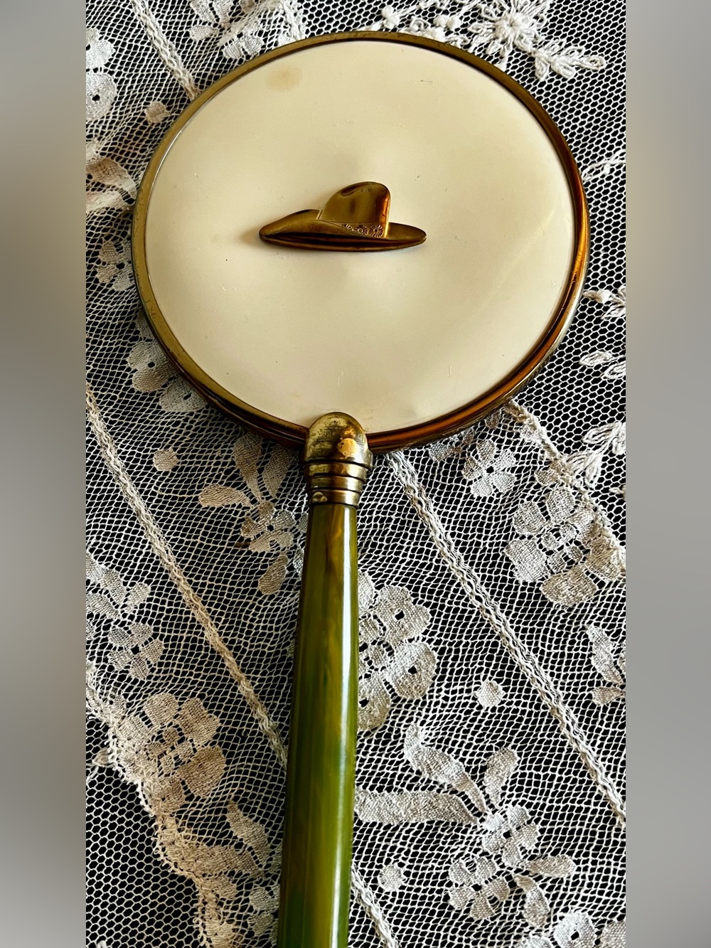 Vintage Art Deco Hand Mirror with Cowboy Hat Motif Bakelite Handle